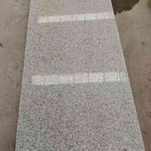 芜湖芝麻白光面毛板