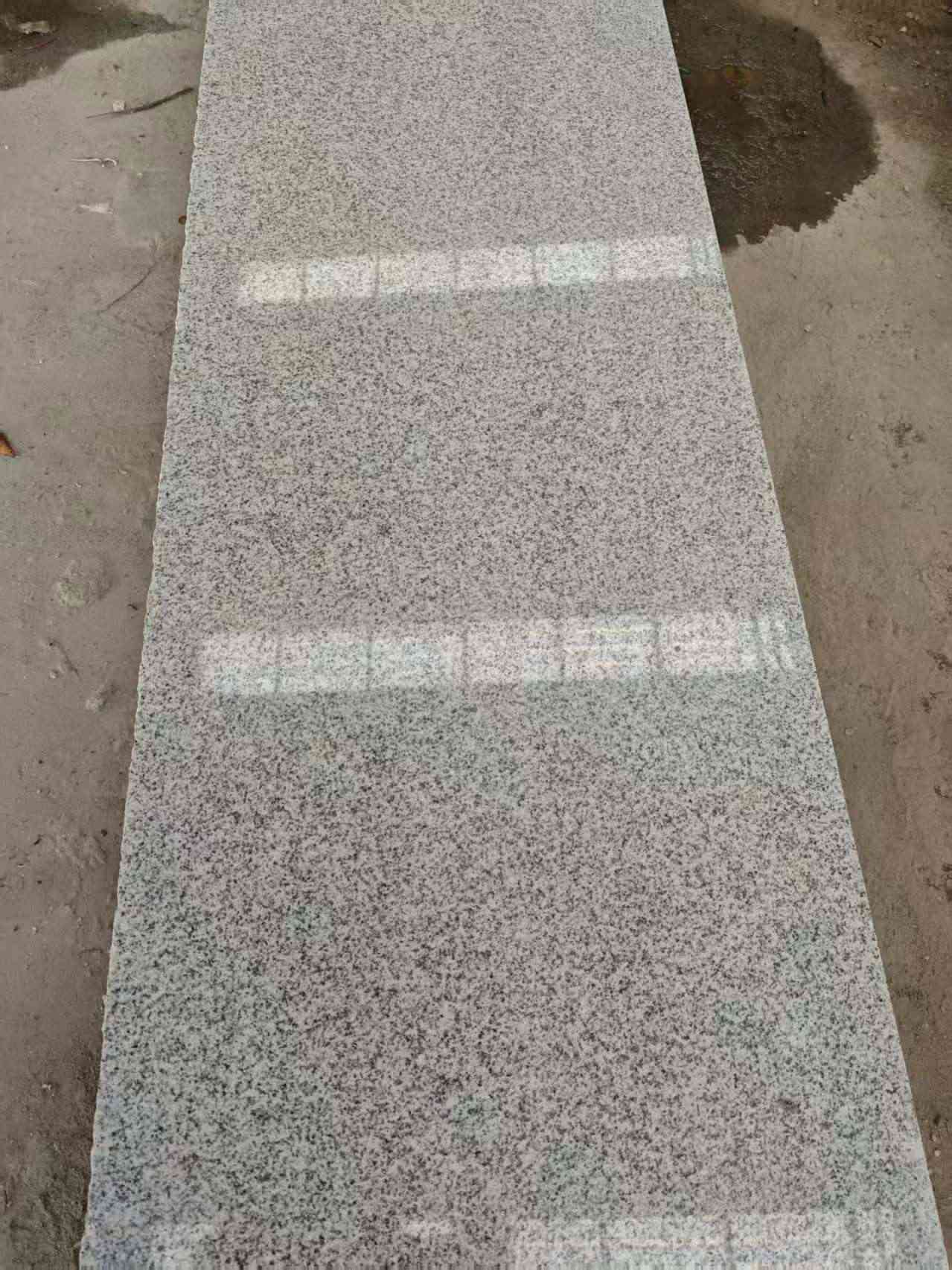 芜湖芝麻白光面毛板